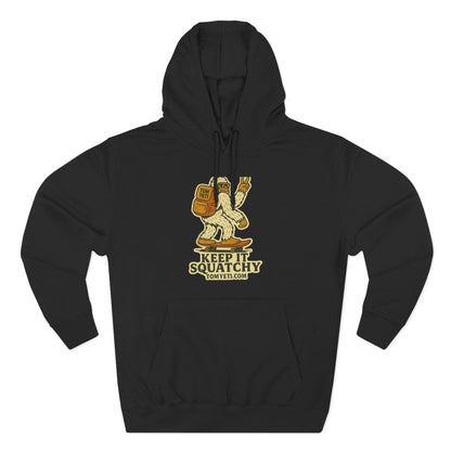 Tom Yeti Keep It Squatchy hoodie black fleece with quirky Bigfoot design, adjustable hood, and kangaroo pocket for cozy outdoor wear