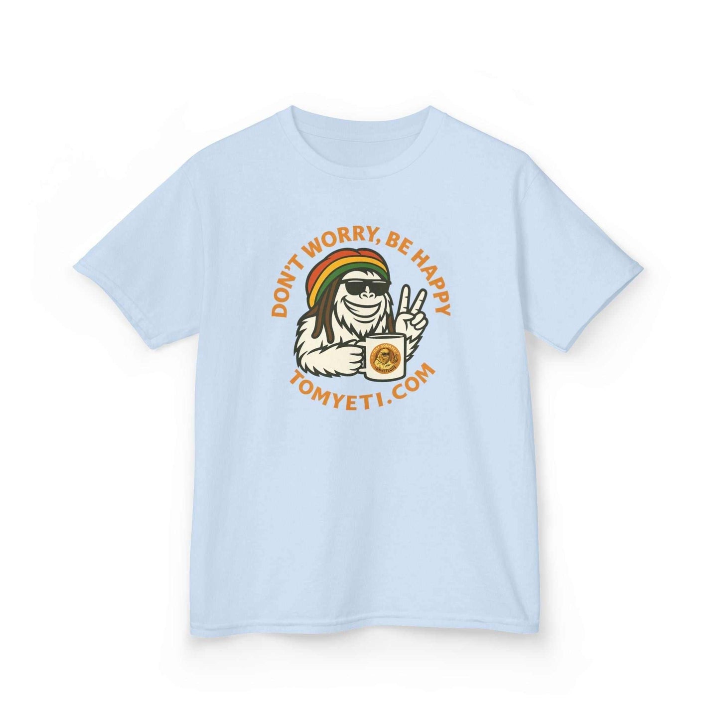 Tom Yeti Official kids light blue t-shirt with "Don't Worry, Be Happy" reggae design and cartoon character holding a coffee mug